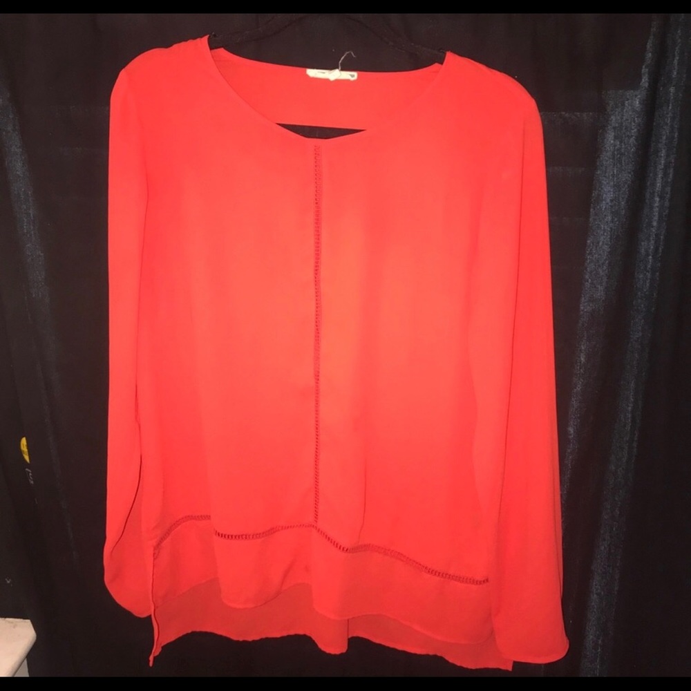 Bright red blouse